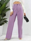 Trendy retro women's trouser suit, purple high-waisted trousers and cropped blazer
