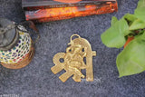 Gold oxidized metal Ganesha wall hanging statue, 4x5 inch, perfect for puja rooms or temples, brings positivity and prosperity
