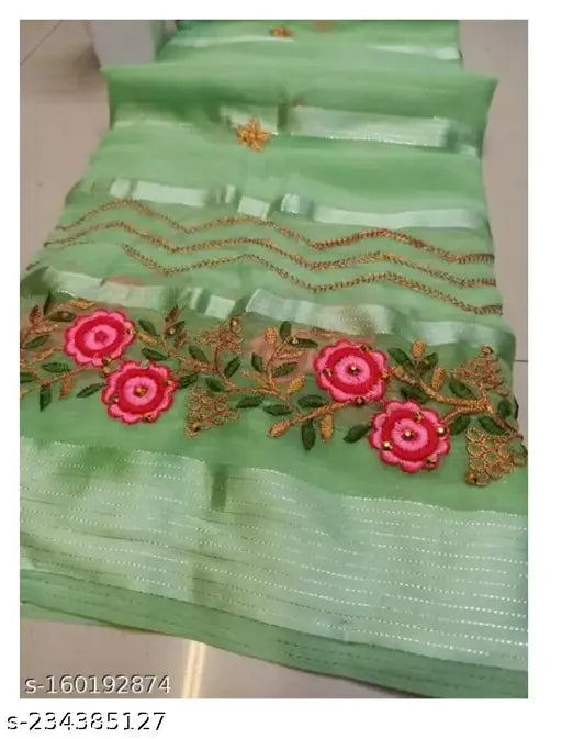 Embroidered net chiffon saree with satin patta and jari weaving, good for festive season. Free size (saree length: 5.5m, blouse length: 0.8m). Indian women's soft waterless saree design launch