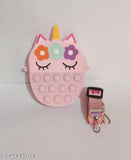 Pink unicorn-shaped Pop It bag. Mini stress relief fidget toy with adjustable strap