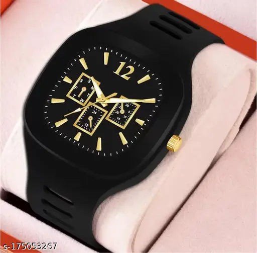 Square-shaped black analog watch with gold detailing and a yellow face, featuring a silicone strap