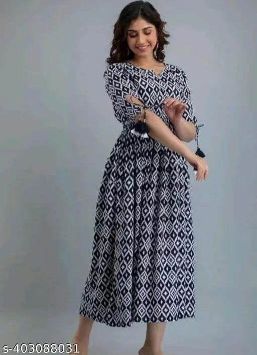Blue rayon Anarkali dress, trendy women's three-quarter sleeve printed combo outfit, India-origin fashion wear on mannequin