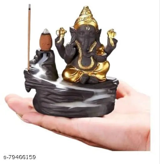Handcrafted orange and gold resin smoke backflow showpiece combo, featuring Lord Buddha and Ganesha. Includes free 20 smoke backflow cones. Indian art for home decoration and gifting