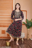 Black gold rayon Naira cut kurti, printed combo three-quarter sleeve fashion for women, close-up view on hanger