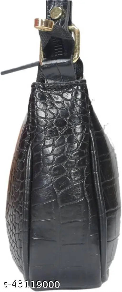 Black crocodile skin sling bag with gold zippers