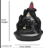 Black resin Haridwar Lord Shiva Adiyogi backflow fountain/incense holder for living room, meditation, yoga gifting. Dimensions: 10cm H x 8cm L x 7cm B