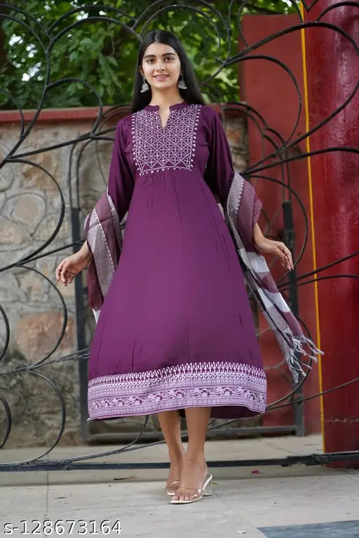 Rayon Anarkali gown with printed net, three-quarter sleeves and embroidered dupatta. Indian fashion for women in sizes M-6XL