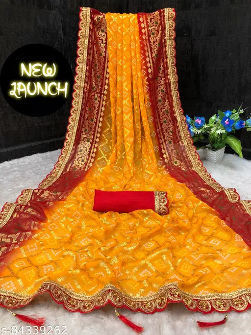 Red and gold saree with yellow fringe