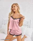 Soft baby pink Malai fabric pajama set for women & girls, featuring adjustable spaghetti straps and scalloped lace trim, made in India