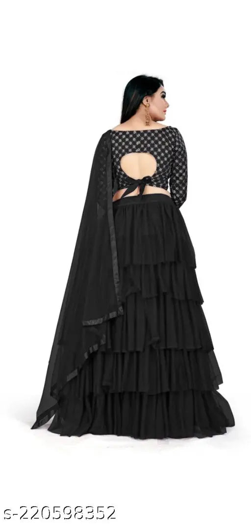 Stylish black flared satin lehenga with net dupatta, embellished for women's traditional Indian wear