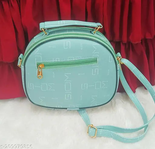 A turquoise crossbody bag with a zipper and a strap