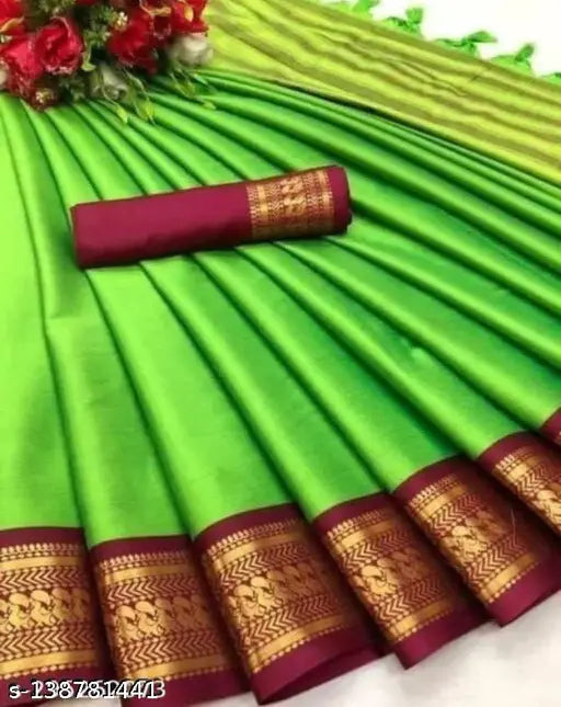 Cotton and silk Mira pattern saree, with blouse piece, displayed on a bed