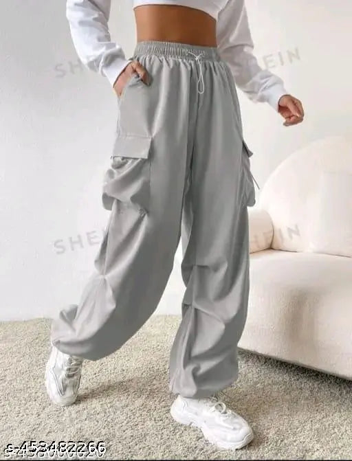 Gray women's joggers with drawstring waist and two large side pockets, mid-calf length