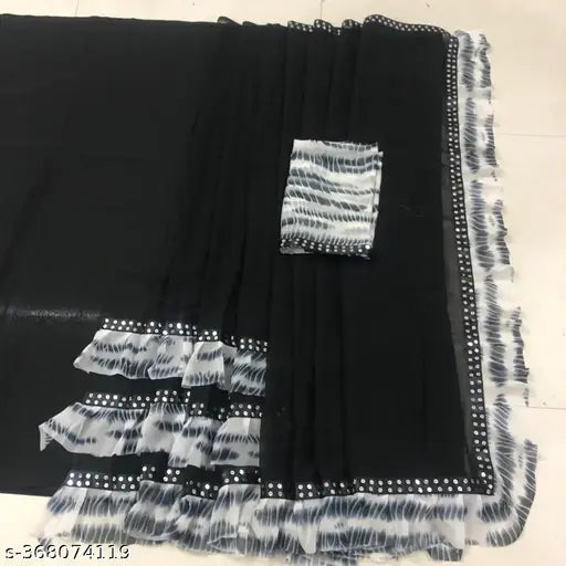 A black and white printed georgette saree with a blouse piece