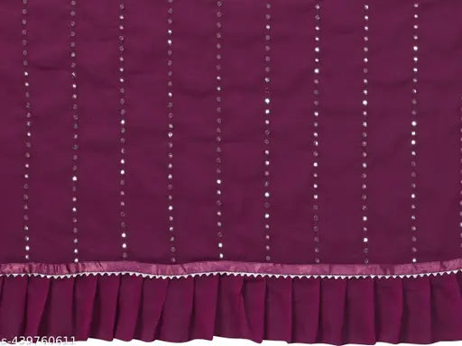 Georgette sari with ruffled trim and mirror work, possibly pink or red