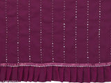 Georgette sari with ruffled trim and mirror work, possibly pink or red