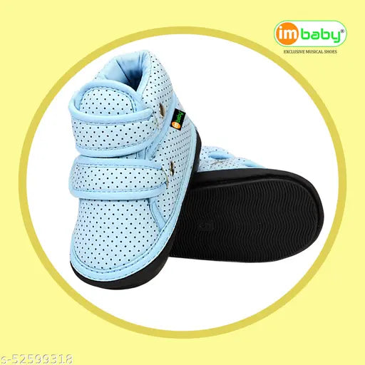 Baby blue boys casual shoes with polka dots and white soles