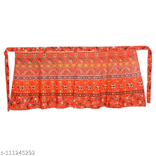 Red cotton wraparound skirt with intricate pattern and matching headscarf