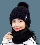 Woolen winter hat in navy blue with pompom