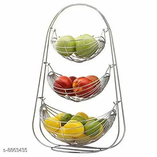 A stainless steel 3 tier fruit storage basket with a variety of colorful fruits