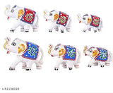 Red-green ceramic elephant figurine set, intricately handcrafted and adorned with mineral beads for home decor