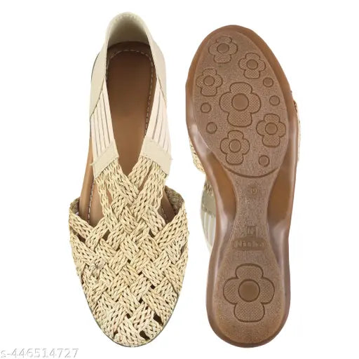 Tan suede ballerina flats with colorful embellishments
