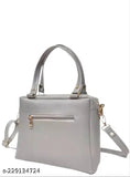 Grey leather shoulder bag with a zipper closure