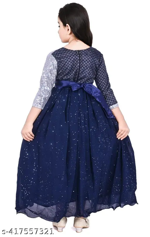 Sky blue long formal ball gown, A-line style, fitted at waist, with blue sequin trim and a flared skirt