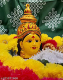 Yellow aluminum Varamahalakshmi Yantra idol, intricately adorned with jewels by Shivoo Fashion