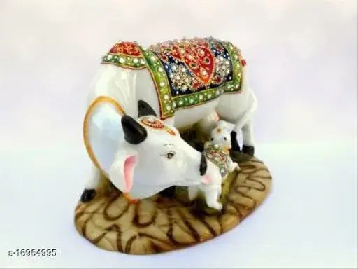 Marble dust polyresin Kamdhenu statue: Handcrafted cow & calf figurine (India)