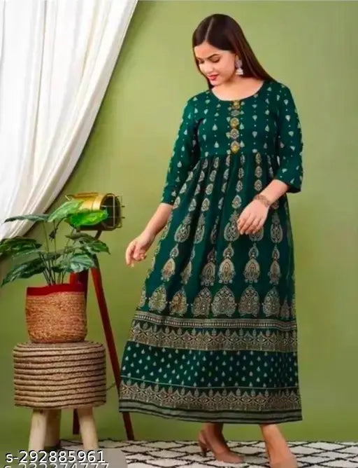 Green rayon women's printed anarkali kurti with three-quarter sleeves, single size options available from S to 5XL. Design by New Kurti Jaipur