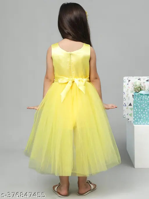 Yellow net embellished dress for kids party wear, high in low design, size 1-2 years