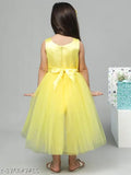 Yellow net embellished dress for kids party wear, high in low design, size 1-2 years