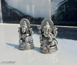 Metal decorative showpiece: Haridwar Trends Goddess Lakshmi and Lord Ganesha idol, 5cm x 8cm x 3cm