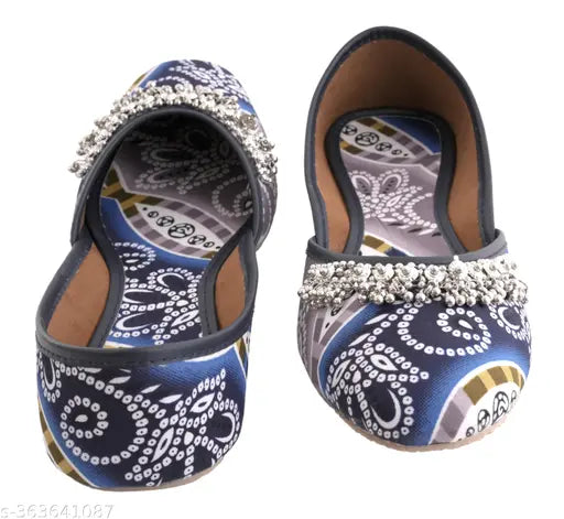 Handcrafted Quikni ethnic jutis for women, textile soles and unique straps. Indian handmade comfortable footwear with printed designs