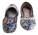Handcrafted Quikni ethnic jutis for women, textile soles and unique straps. Indian handmade comfortable footwear with printed designs