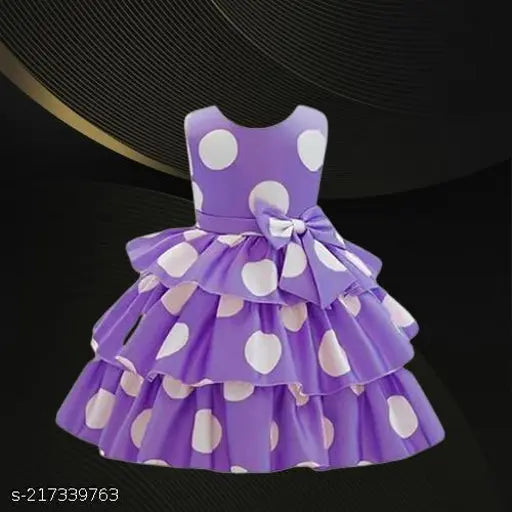 Pink polka dot cotton baby dress with ruffled sleeves