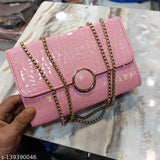 Pink faux leather clutch purse with gold chain accents, featuring multiple pockets and a circular metal hardware detail