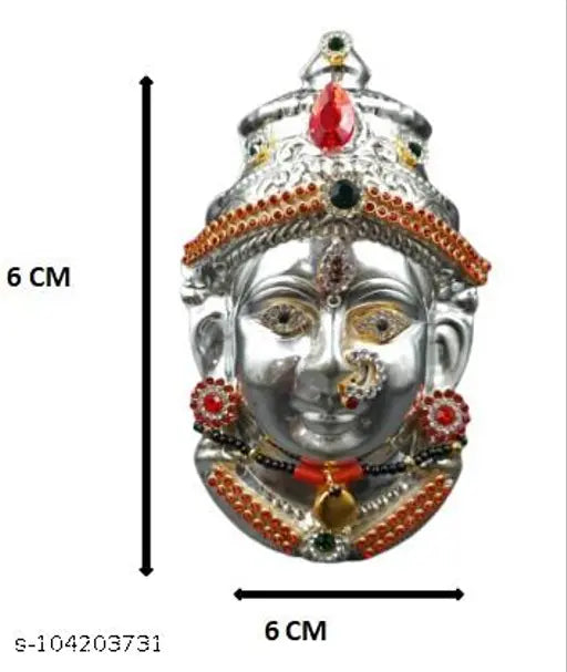 German silver Lakshmi face, intricately detailed metal god idol from India