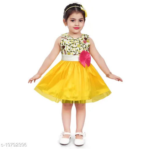 Yellow and white baby girl's party dress