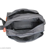 A gray sling bag with four zippered compartments