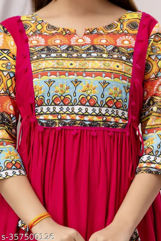 Colorful embroidered kameez with red border, long sleeves, fitted waist