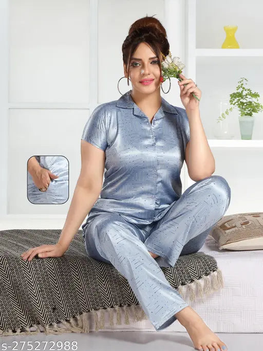 Imported satin material night suit from Nandani Hosiery, printed net design, short-sleeved pyjamas set on display