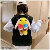Black fanny pack with multicolored furry creature charm