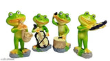 Four frog figurines playing musical instruments set in a light wood stand, 10cm height