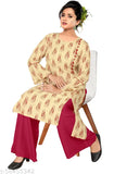 Rayon dot print kurta set with palazzos, round neck, three-quarter sleeves. Premium quality Indian ethnic women's fashion for events
