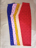 A collection of women's pajamas in various colors and patterns