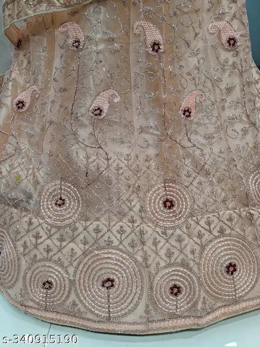 Peach satin-net embroidered Lehenga, India - Elegant semi-stitched partywear for women