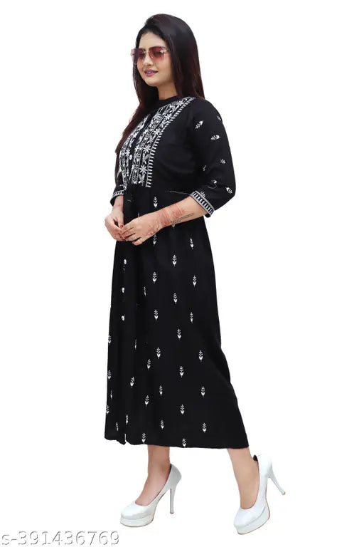 A long-sleeve women's embroidered kurta with a traditional design, in black and white on a printed fabric