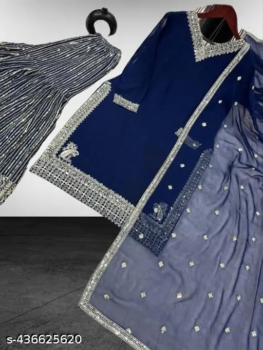 New kurta set in navy blue with embellished design and black embroidery on a white background